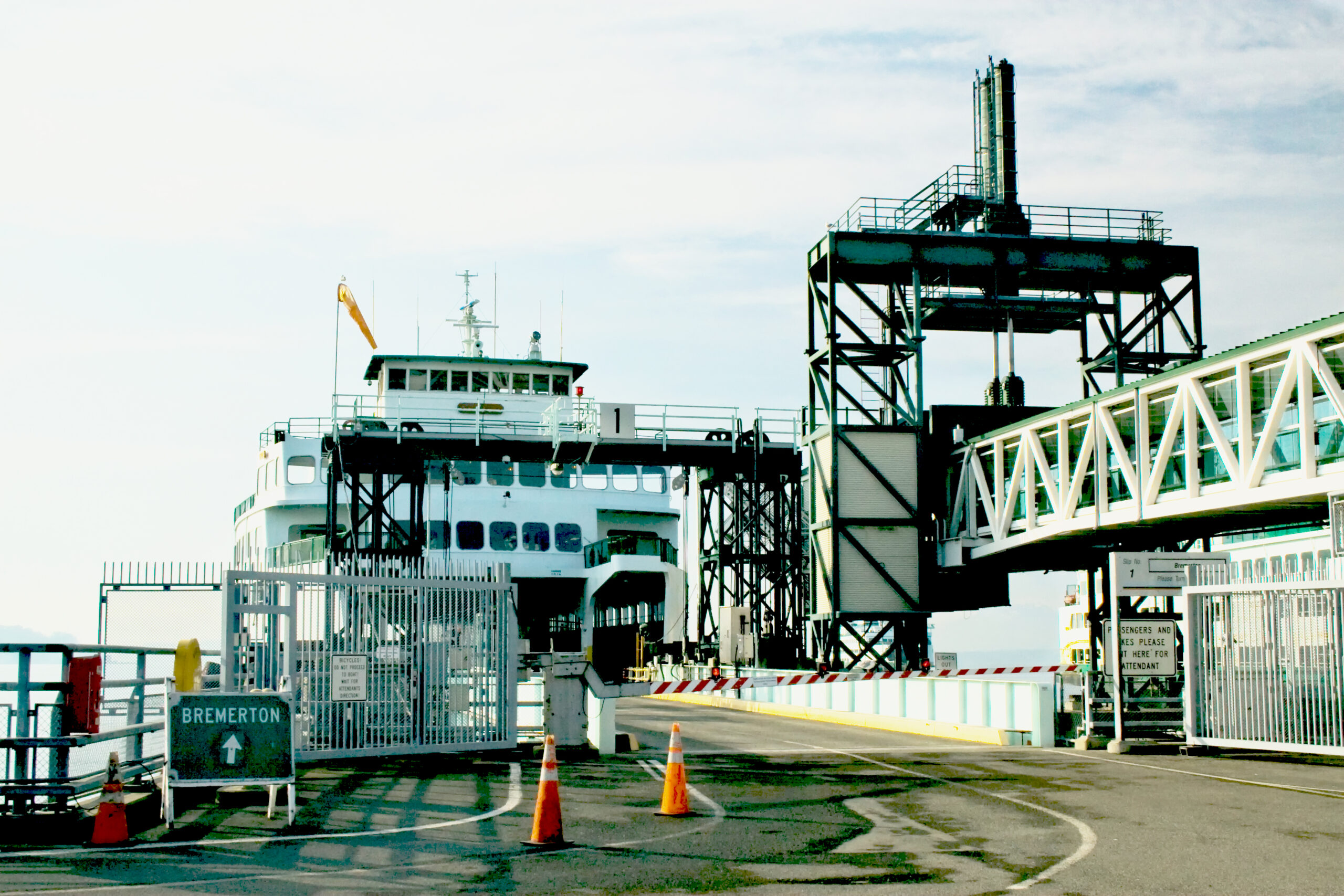 Bremerton waterfront boardwalk with modern apartments, marina, and pedestrian walkway